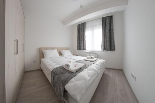 Pegasus apartmentsにあるベッド