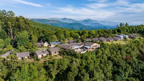 an aerial view of a house in the mountains at Misty Mountain in Sabie