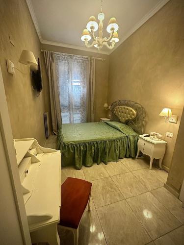 Postel nebo postele na pokoji v ubytování Boutique Hotel Calais Milano