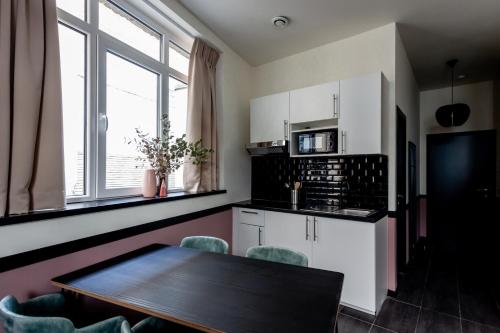 Η κουζίνα ή μικρή κουζίνα στο Hey - Aparthotel Brussels