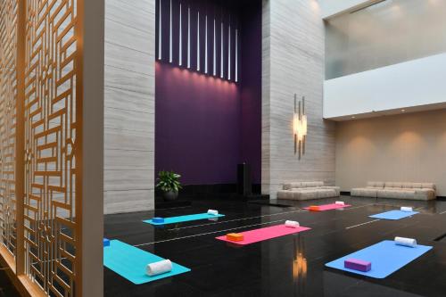 a lobby with yoga mats on the floor at Al Messila, A Luxury Collection Resort & Spa, Doha in Doha