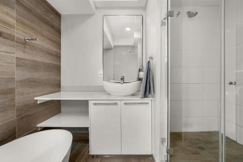 A bathroom at The Regency Apartments