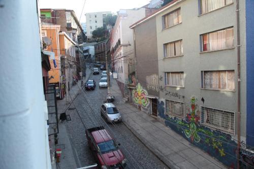 a view of a street with cars parked on the street at Hostal Po in Valparaíso