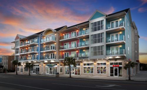 a rendering of a building on a city street at Ocean Escape Condos in Myrtle Beach