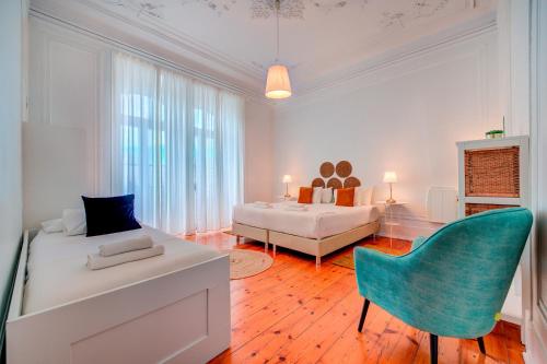 Ένα ή περισσότερα κρεβάτια σε δωμάτιο στο Chalet D´Ávila Guest House