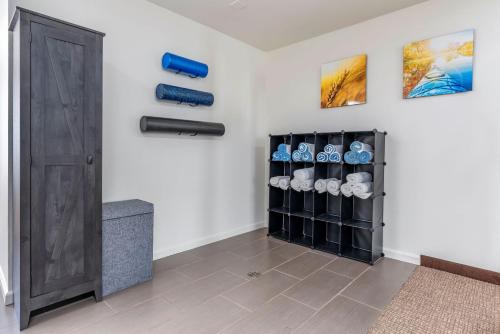 a room with a door and a wine cellar at Comfort Suites Red Bluff near I-5 in Red Bluff