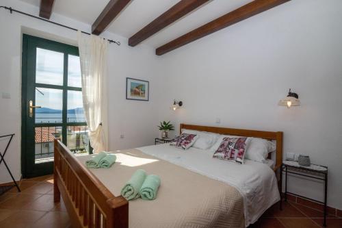Postel nebo postele na pokoji v ubytování Apartment Zvonimir