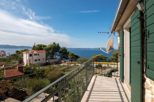 a balcony with a view of the ocean at Apartment Zvonimir in Igrane