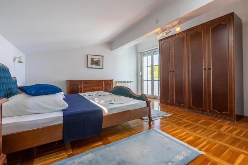Postel nebo postele na pokoji v ubytování Apartments Vila Antula