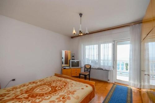 Posteľ alebo postele v izbe v ubytovaní Apartments Lucia