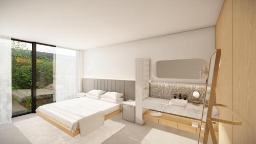 a white bedroom with a bed and a large window at Vain Boutique Hotel in Buenos Aires