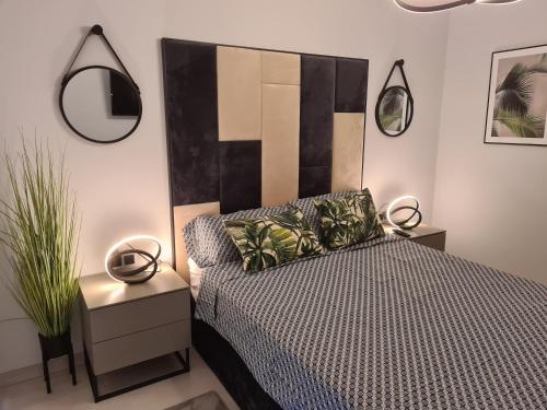 Posteľ alebo postele v izbe v ubytovaní Apartament Sunset Waves 67