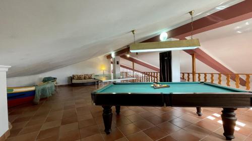 a pool table in the middle of a living room at Espraguina - Private Pool - 16 Guests - Loulé in Loulé