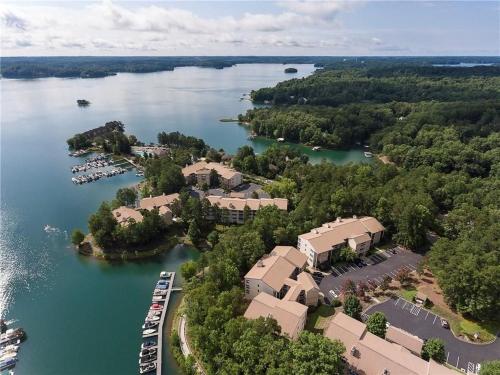 an aerial view of a resort on a lake at Lake front Keowee Condo with Balcony & Resort Amenities! 20 min to Clemson condo in Salem