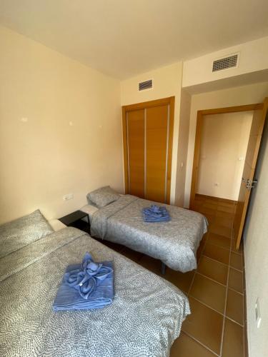Säng eller sängar i ett rum på Espacioso Apartamento en Archena