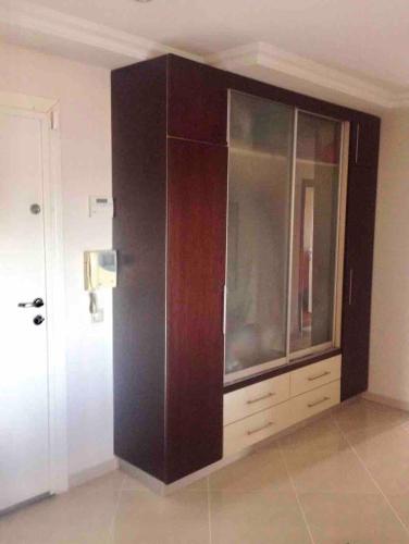 ein großer Holzschrank in einem Zimmer mit einer Tür in der Unterkunft Private Room in Istanbul #55 in Istanbul
