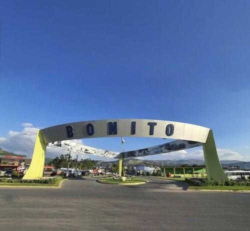 a large sign that says donation in a parking lot at Seu lar em Bonito-PE in Bonito