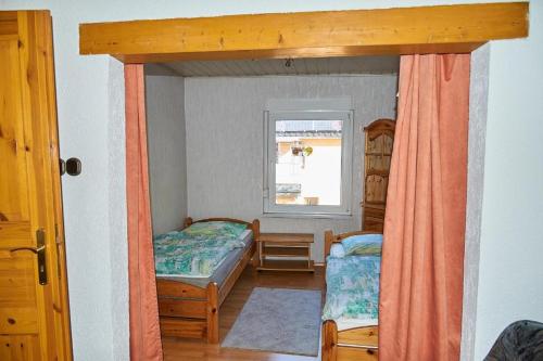 Postel nebo postele na pokoji v ubytování Schwalbenhof Wöllnau
