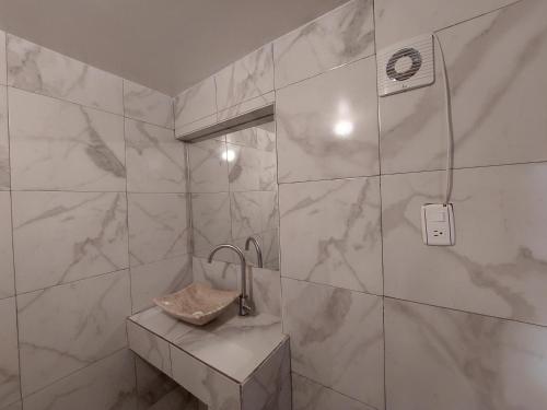 a bathroom with a shower and a sink at Casa Nopal Tu casa vacacional tipo hotel in Creel