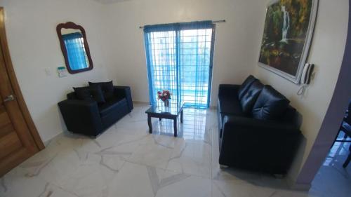 Posezení v ubytování Apartamento amueblado en Santiago, Res Blue Amber, 2 habitaciones