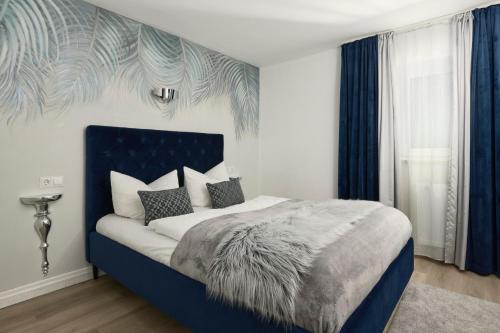 Letto o letti in una camera di Aparthotel Voglergasse