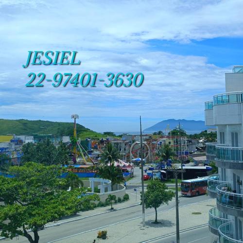 a view of a city with a sign that reads jesel at ** SUITE PRIVATIVA PRAIA DO FORTE CABO FRIO ** in Cabo Frio