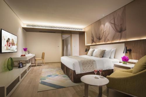 Voodi või voodid majutusasutuse Citadines Intime City Hangzhou toas