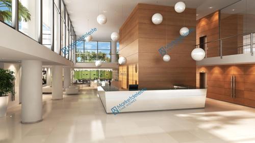 a lobby with a reception desk in a building at Apartamento Punta del Este in Punta del Este