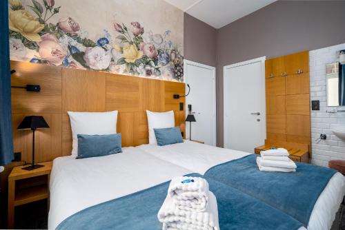Cama o camas de una habitación en Hotel Jacobs