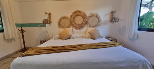 Postel nebo postele na pokoji v ubytování Hotel Taboga Eco Boutique & Spa Costa Esmeralda