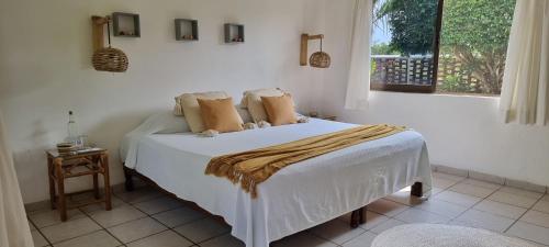 Postel nebo postele na pokoji v ubytování Hotel Taboga Eco Boutique & Spa Costa Esmeralda