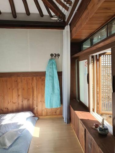 Postel nebo postele na pokoji v ubytování Percent Guesthouse