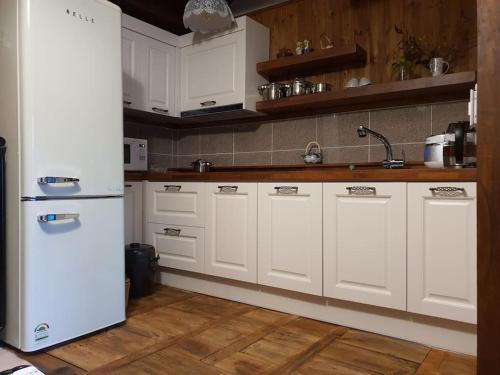 Kuchyň nebo kuchyňský kout v ubytování Percent Guesthouse