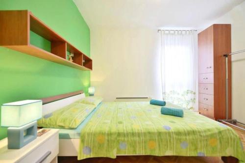Una cama o camas en una habitación de Apartment Vicko
