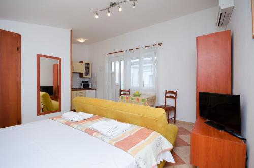 Posteľ alebo postele v izbe v ubytovaní Apartments Jasminka