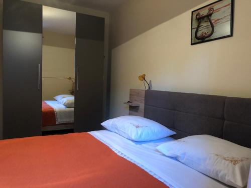 Postel nebo postele na pokoji v ubytování Apartment Jelka