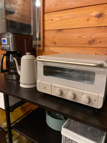 Una cocina o zona de cocina en -PaprumBase北軽井沢- 高台に佇む一軒家貸別荘とテントサウナ11名まで可
