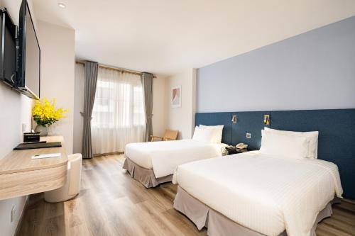 Jovia Hotelにあるベッド