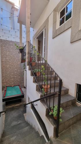 a set of stairs with potted plants on them at Cayalito Apart Hotel in Guatemala