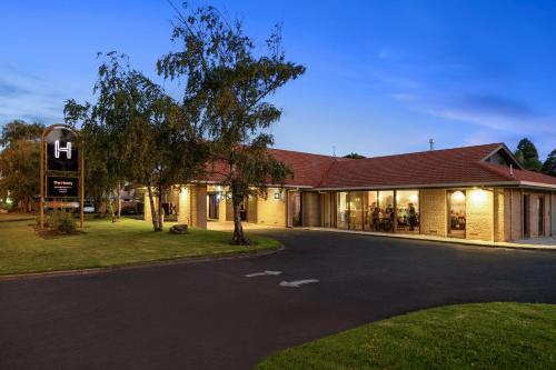 a building with a road in front of it at The Henty in Mount Gambier