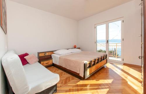 Posteľ alebo postele v izbe v ubytovaní Apartments Jasna