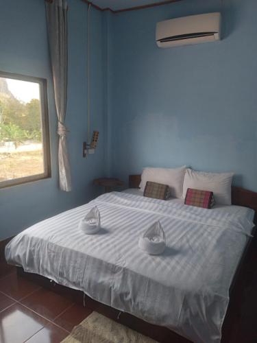 Ένα ή περισσότερα κρεβάτια σε δωμάτιο στο Lamorn Guesthouse