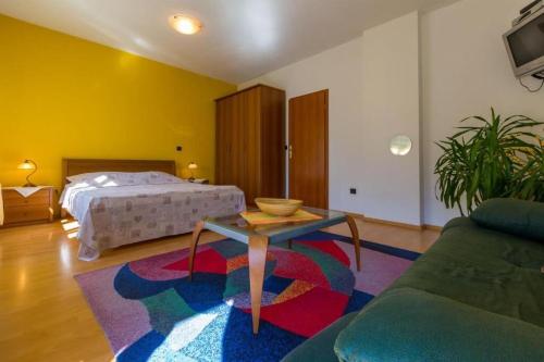 Posteľ alebo postele v izbe v ubytovaní Apartments Villa Katarina