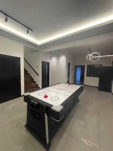 a large room with a table in the middle of it at 5000 SQFT BRAND NEW Semi-D Hype Home 10pax in Ipoh