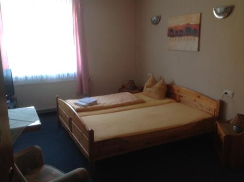 Katil atau katil-katil dalam bilik di Gasthof Stadt Brandenburg