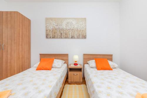 Postel nebo postele na pokoji v ubytování Rooms Ivo