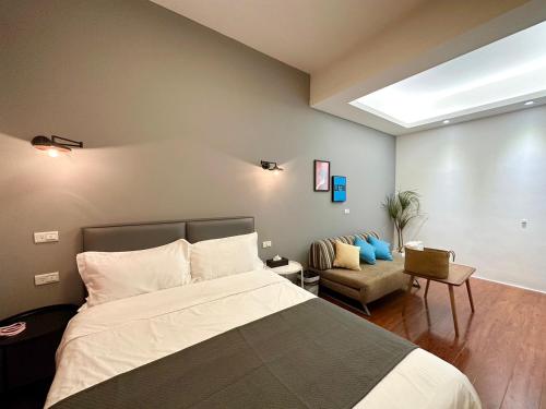 Postel nebo postele na pokoji v ubytování 游遊民宿 Yulazy inn 寵物友善 I 包棟