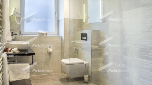 Um banheiro em Villa Westend Hotel an der Messe
