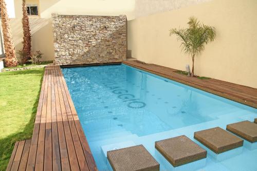A piscina localizada em Villaggio Hotel Boutique ou nos arredores