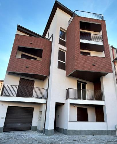 an apartment building with two balconies at Ft House in Castel di Sangro